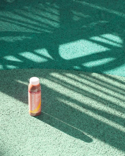 Smoothie products on the surface of the bottle. It's light brown

